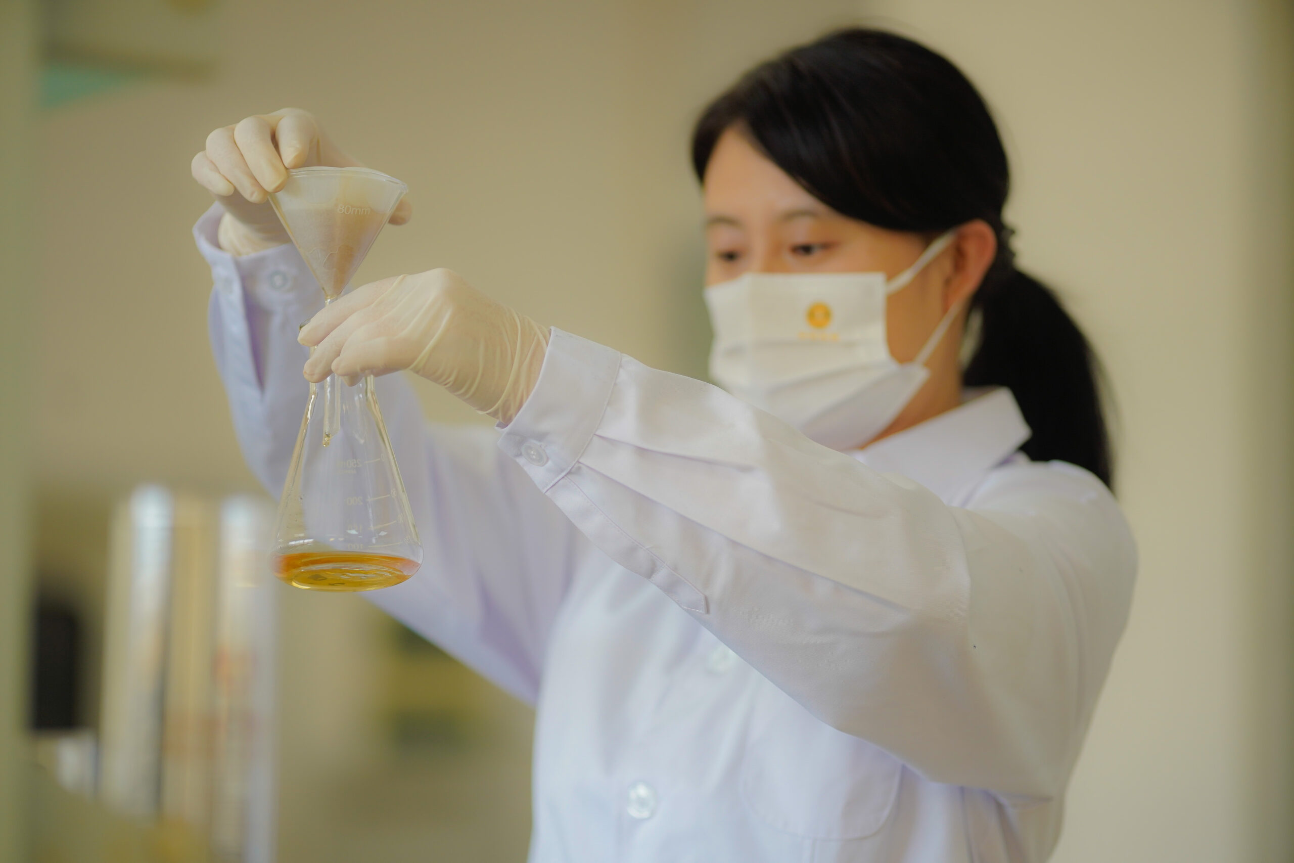 Nutritionist in lab conducting formulation tests